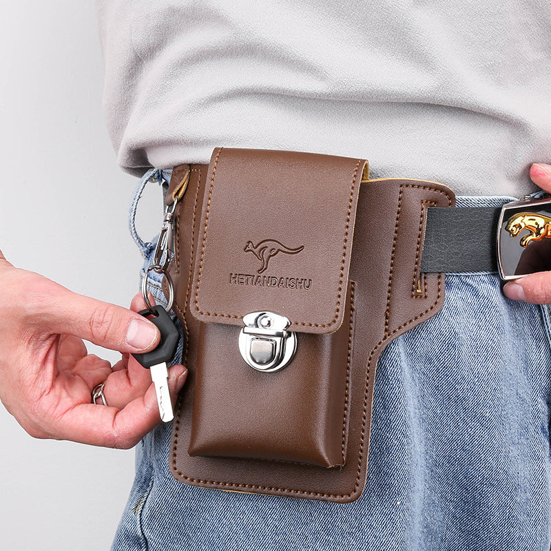 Brown leather waist bag with flap, buckle, kangaroo logo, and key holder