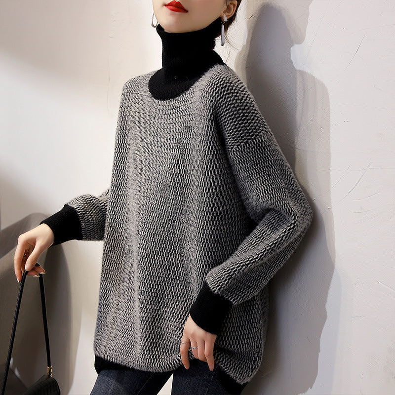 Women’s knit turtleneck sweater in dark charcoal, relaxed fit with long sleeves.
