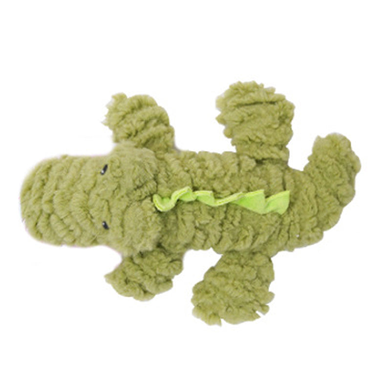 Green corduroy plush crocodile dog toy with bow and embroidered eyes