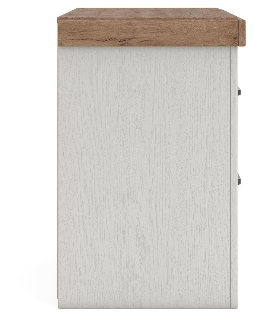 White nightstand cabinet with brown top, side view showing black hardware accents