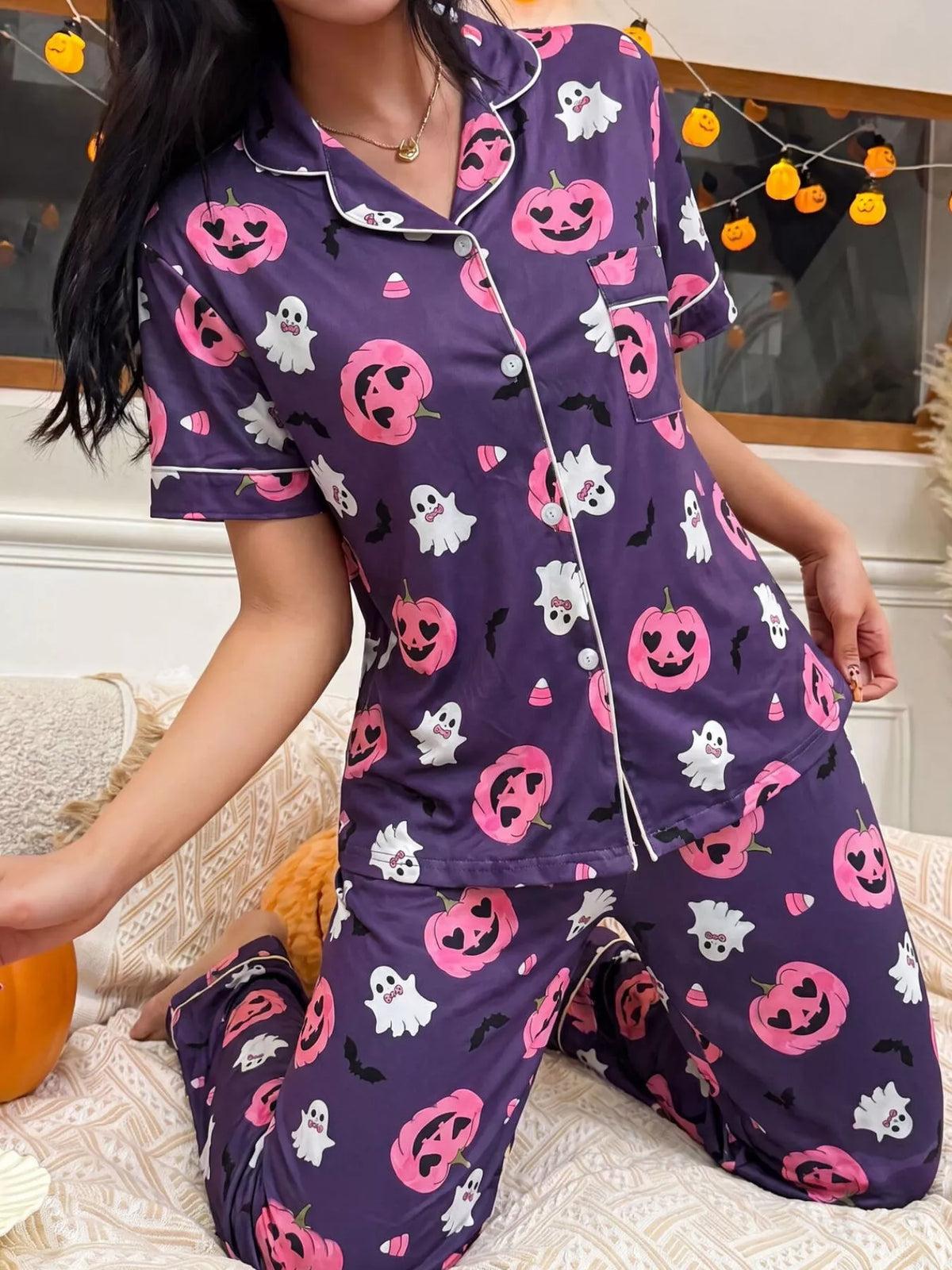 Kids' Halloween pajama set in purple with jack-o'-lantern and ghost button-down top and pants