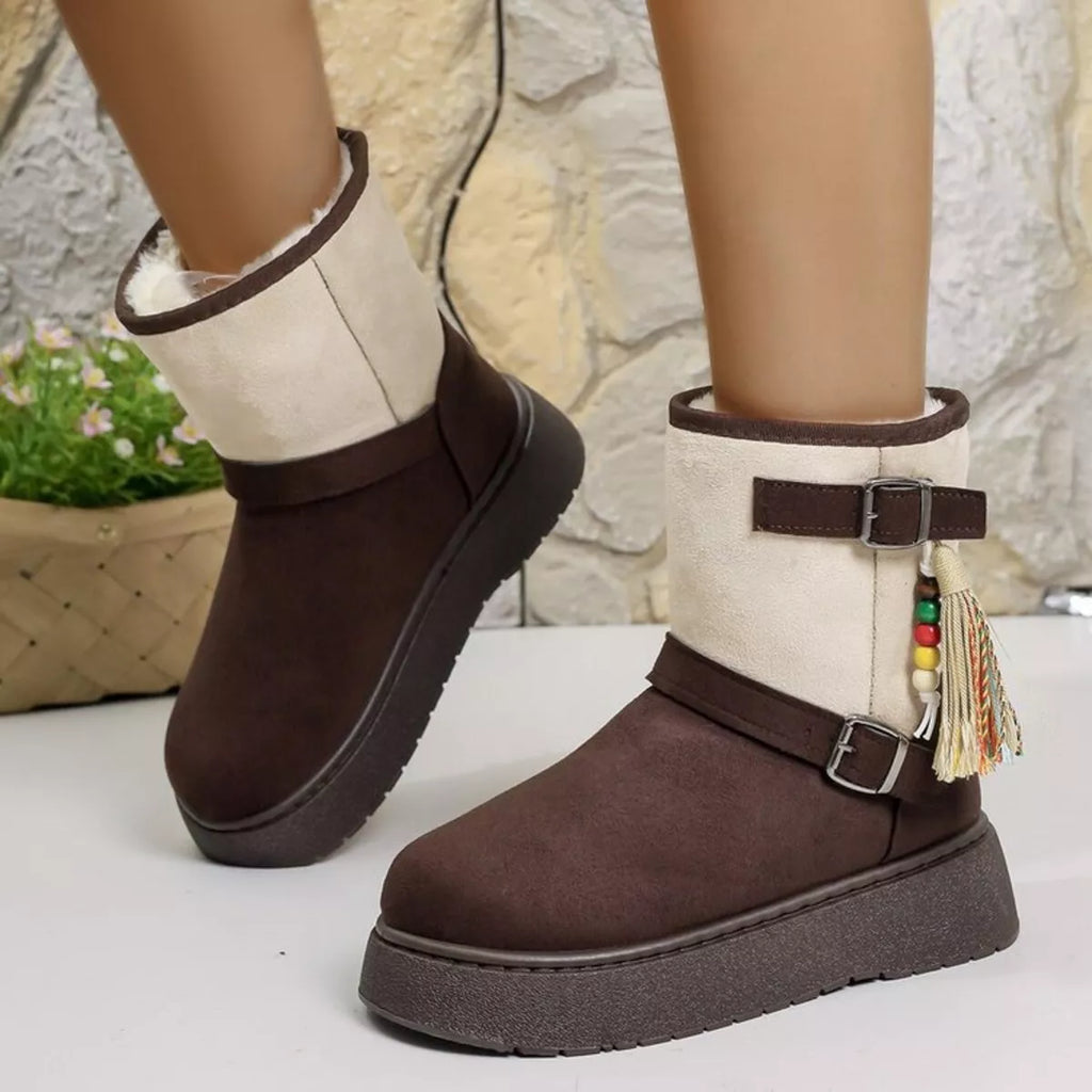 Brown ankle boots with white panels, buckle strap, tassel trim, chunky outsole