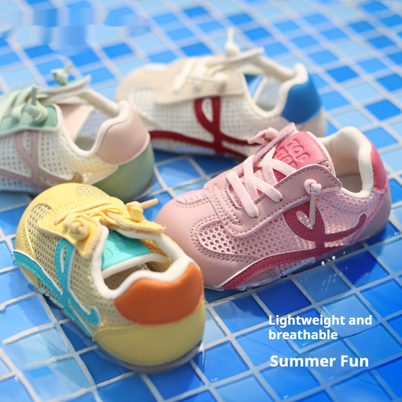 Pink toddler lace-up sport shoes with mesh panels and red logo accents