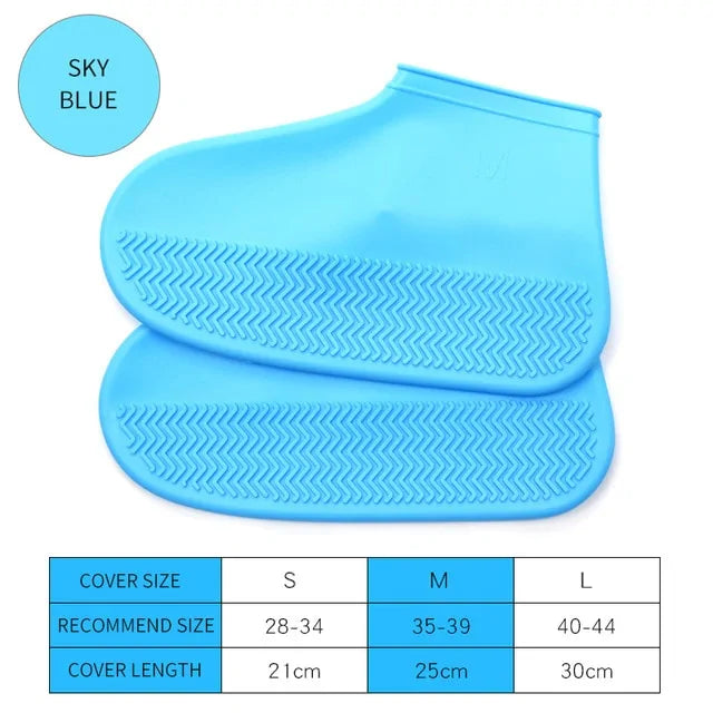 Sky blue silicone shoe cover boots with chevron tread, pair stacked