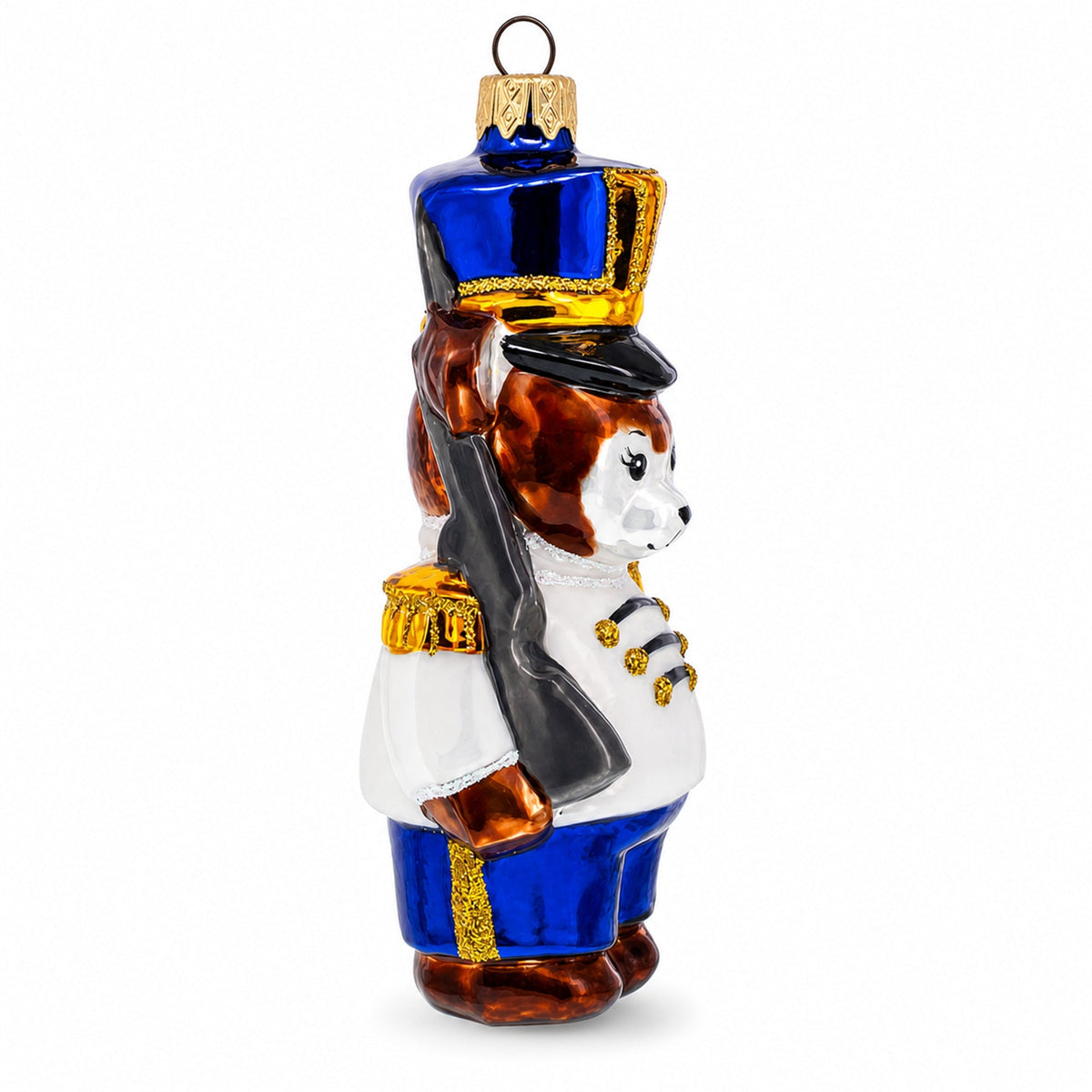 Glass nutcracker bear ornament side view, blue and gold hat, black coat, white shirt