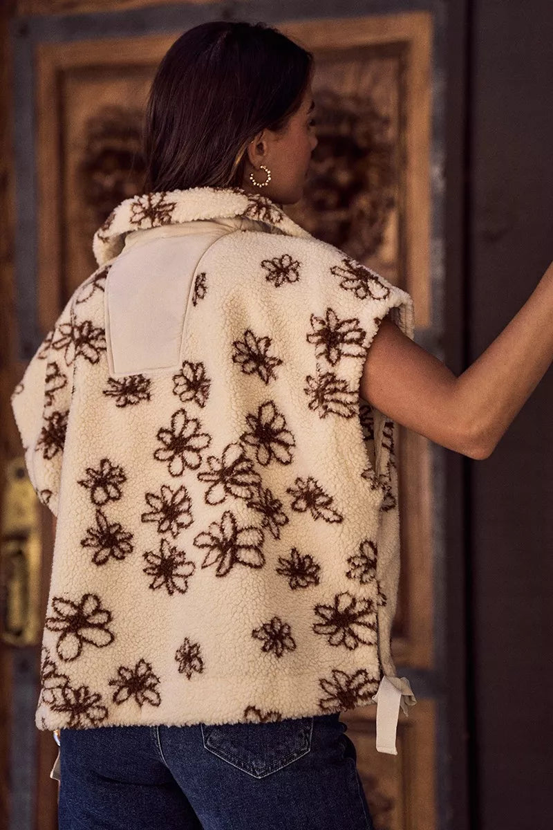 Oversized sleeveless sherpa vest jacket back, cream with dark brown floral embroidery and ties