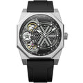 Silver-tone tonneau skeleton quartz wristwatch with black silicone strap, right-side crown