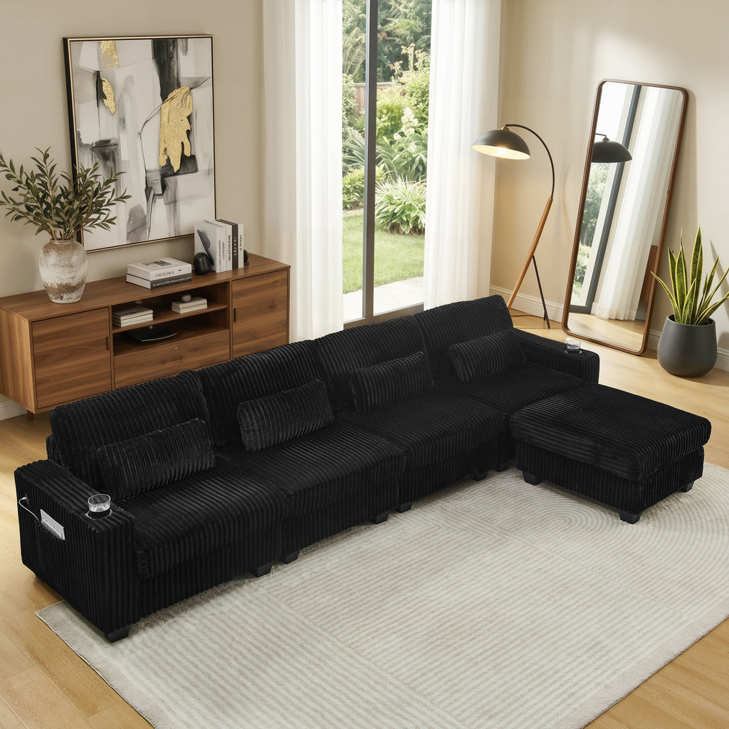 Black corduroy L-shaped sectional sofa with chaise and ottoman seating unit