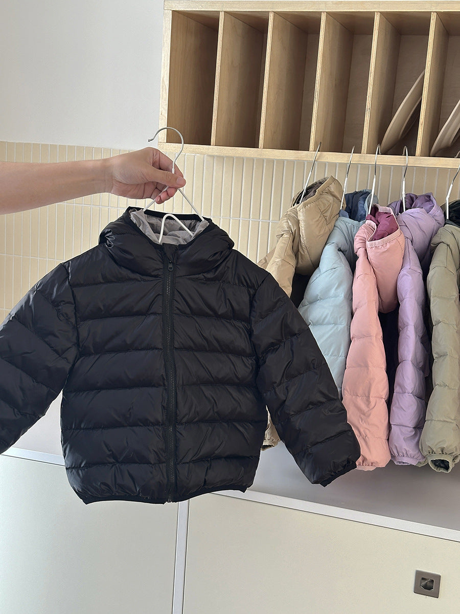 Kids' black hooded puffer jacket with full zip front and quilted padded insulation