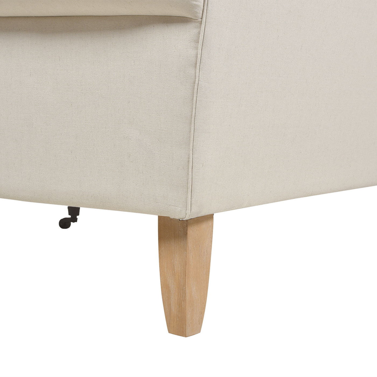 Light beige sofa corner with straight base seam and light wood legs