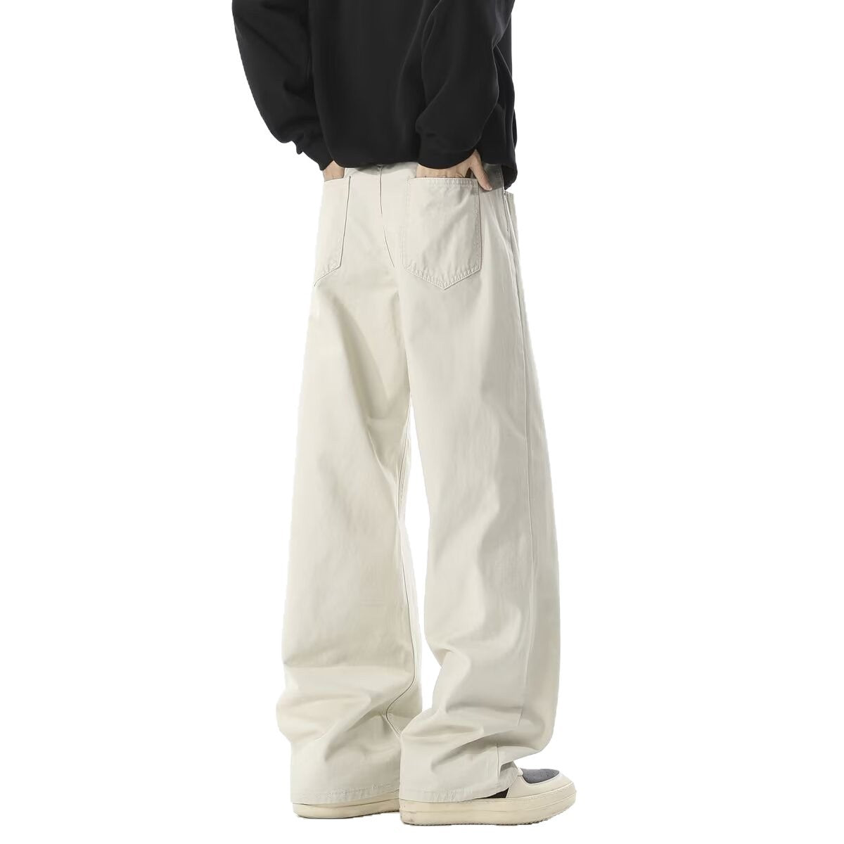 Beige cargo pants showing side pockets and straight wide trouser legs