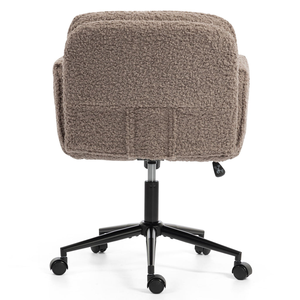 Dark brown fabric desk chair close-up with padded back and seat on black rolling base.