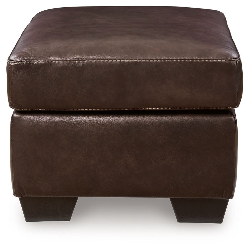 Brown upholstered ottoman with stitched top cushion and dark angled legs