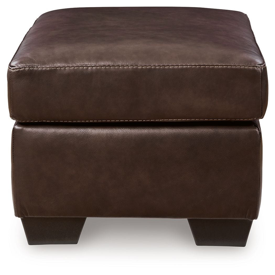 Brown upholstered ottoman with stitched top cushion and dark angled legs