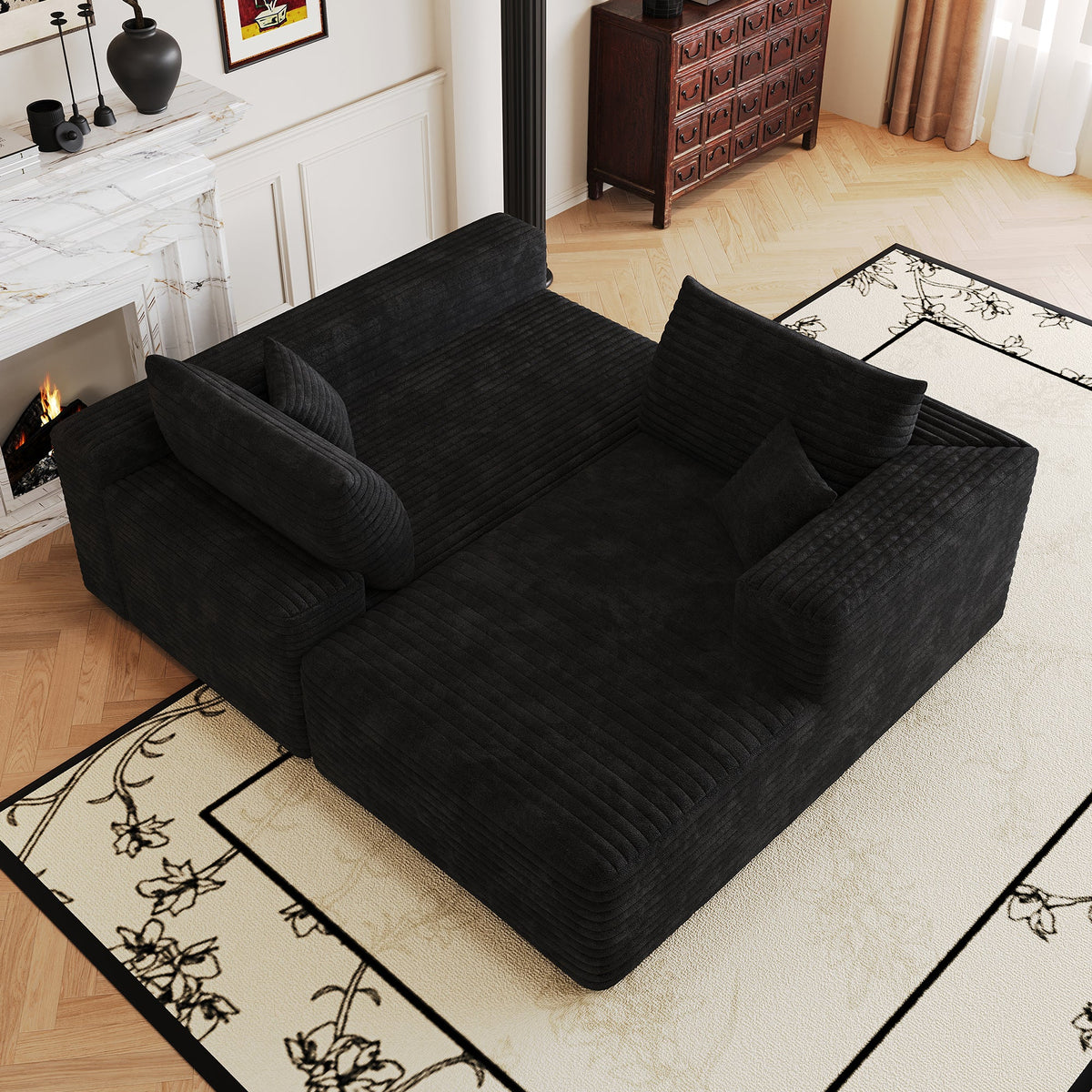 Dark corduroy sectional sofa with chaise and tufted-look seat cushions, top view