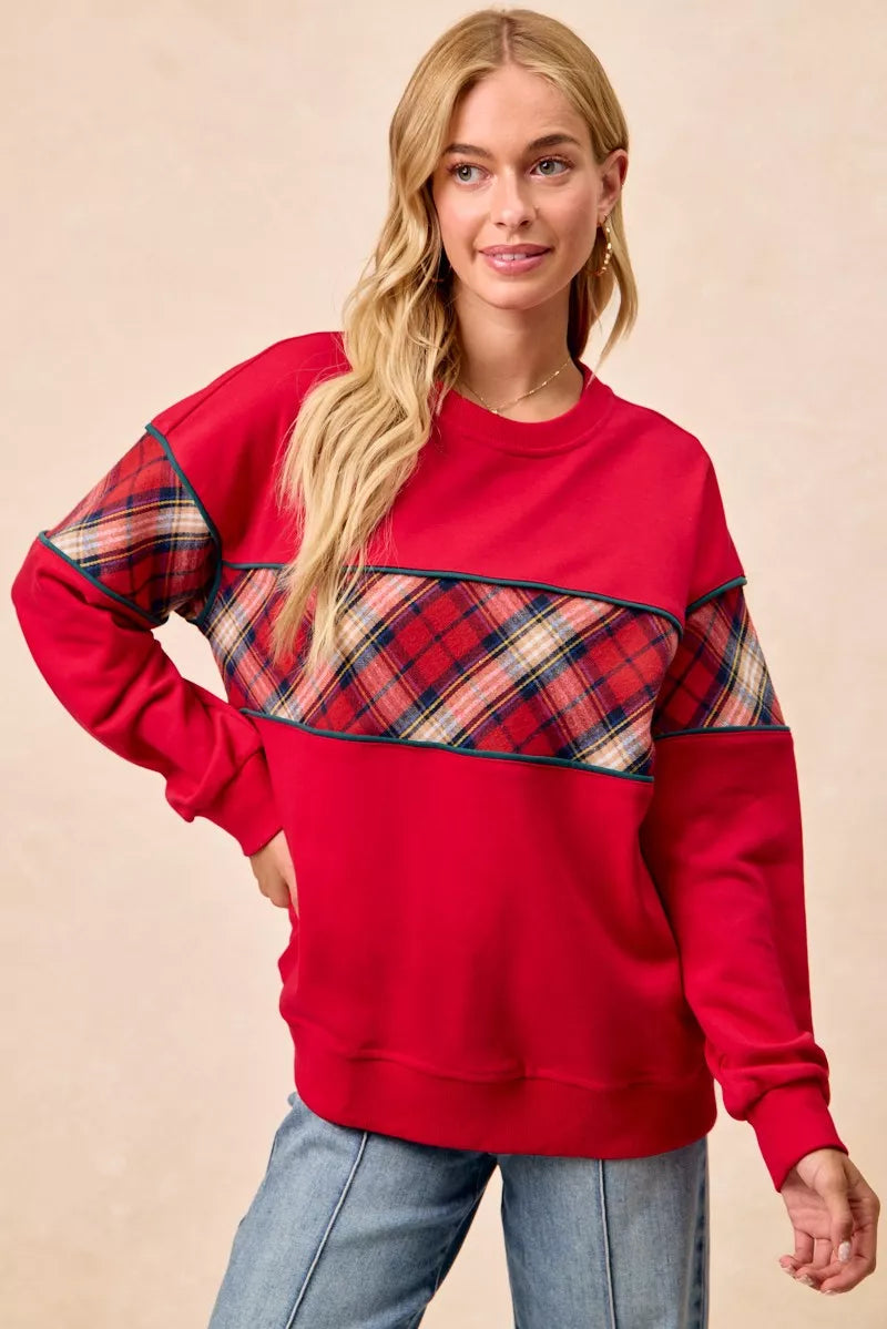 Red sweatshirt with plaid block front and contrasting teal trim, crew neck, long sleeves