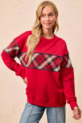 Red sweatshirt with plaid block front and contrasting teal trim, crew neck, long sleeves