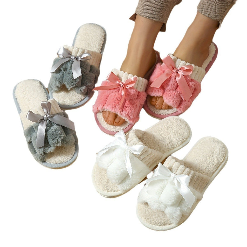 Assorted plush bow slippers in gray, pink, and white with ribbon accents