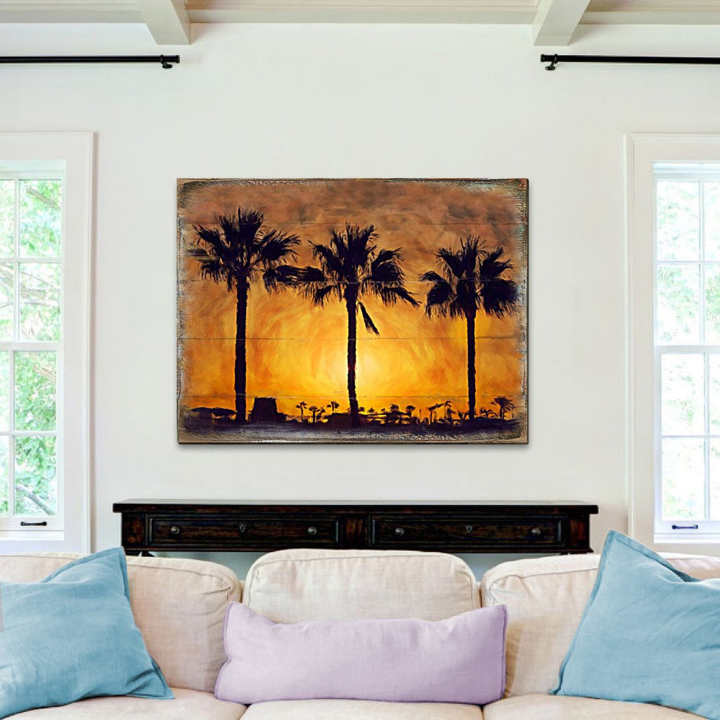 Palm tree sunset wooden wall art with silhouetted palms and golden-orange sky
