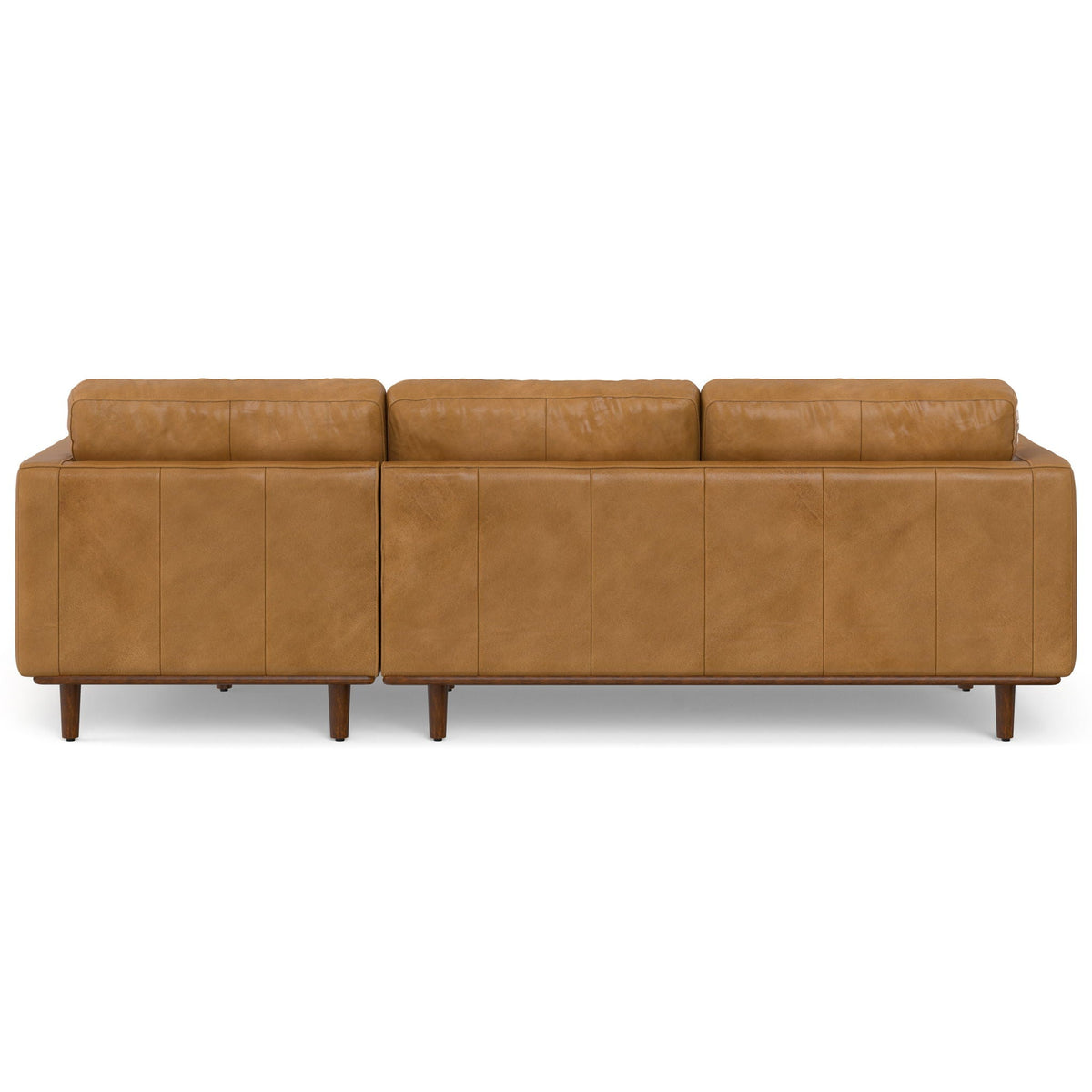 Cognac-brown upholstered sectional sofa with three back cushions and chaise ottoman
