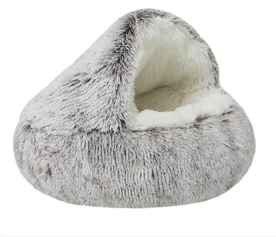 Gray semi-closed cat bed with thick plush fabric and warm-looking inner nest