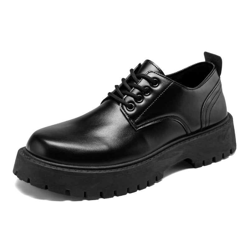 Black men’s derby dress shoe with lace-up front and thick lug sole.