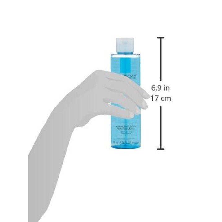 Effaclar face toner bottle held in hand, showing 6.9 in height