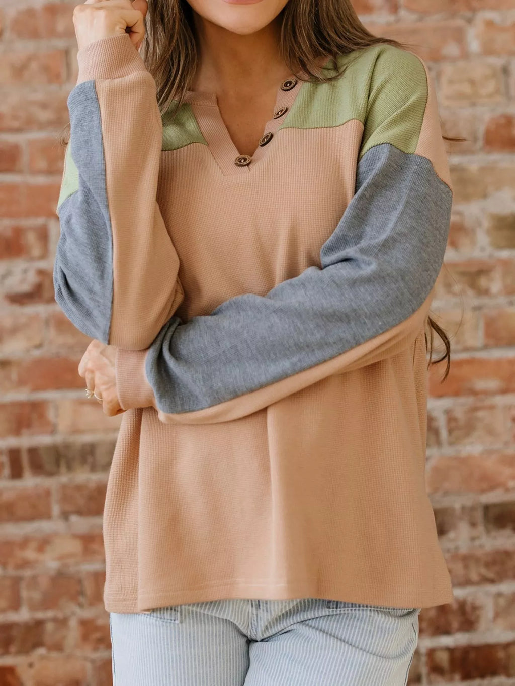 Color block thermal knit henley top in camel with green front yoke and gray sleeves