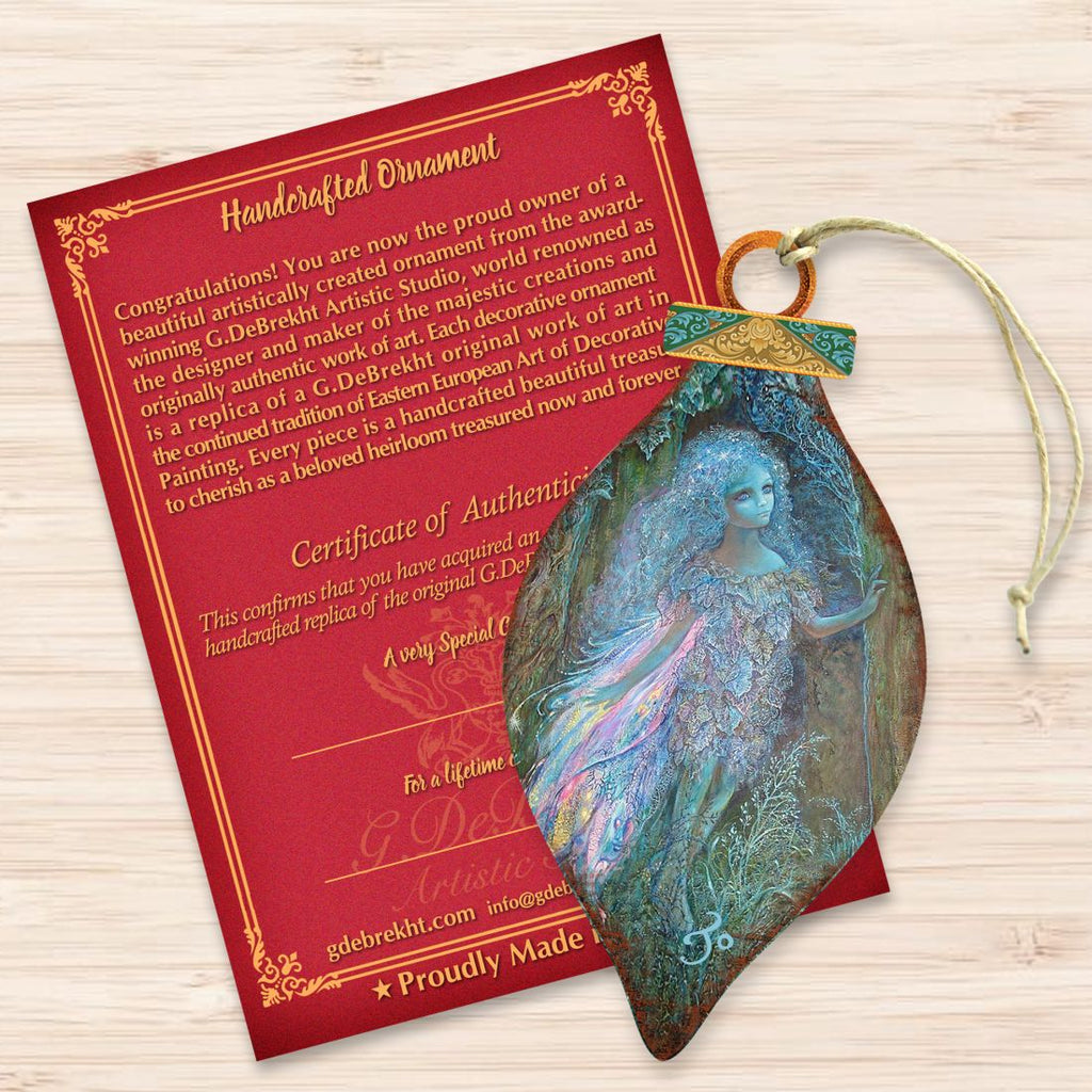 Teardrop wooden forest fairy ornament with blue fairy art, with certificate card and twine.