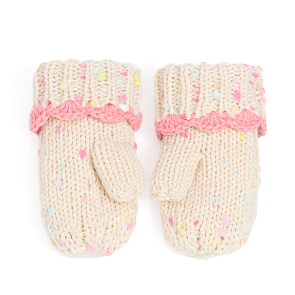 Cream knit toddler mitten with pink ruffle cuff and pastel speckle pattern