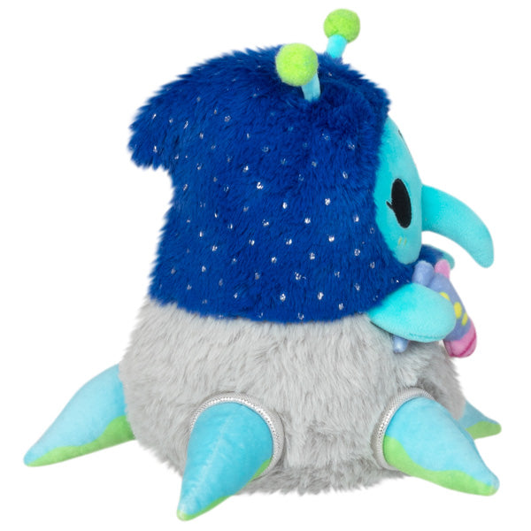 Plush plague doctor alien facing side view, blue hood, gray belly, green antenna, scarf