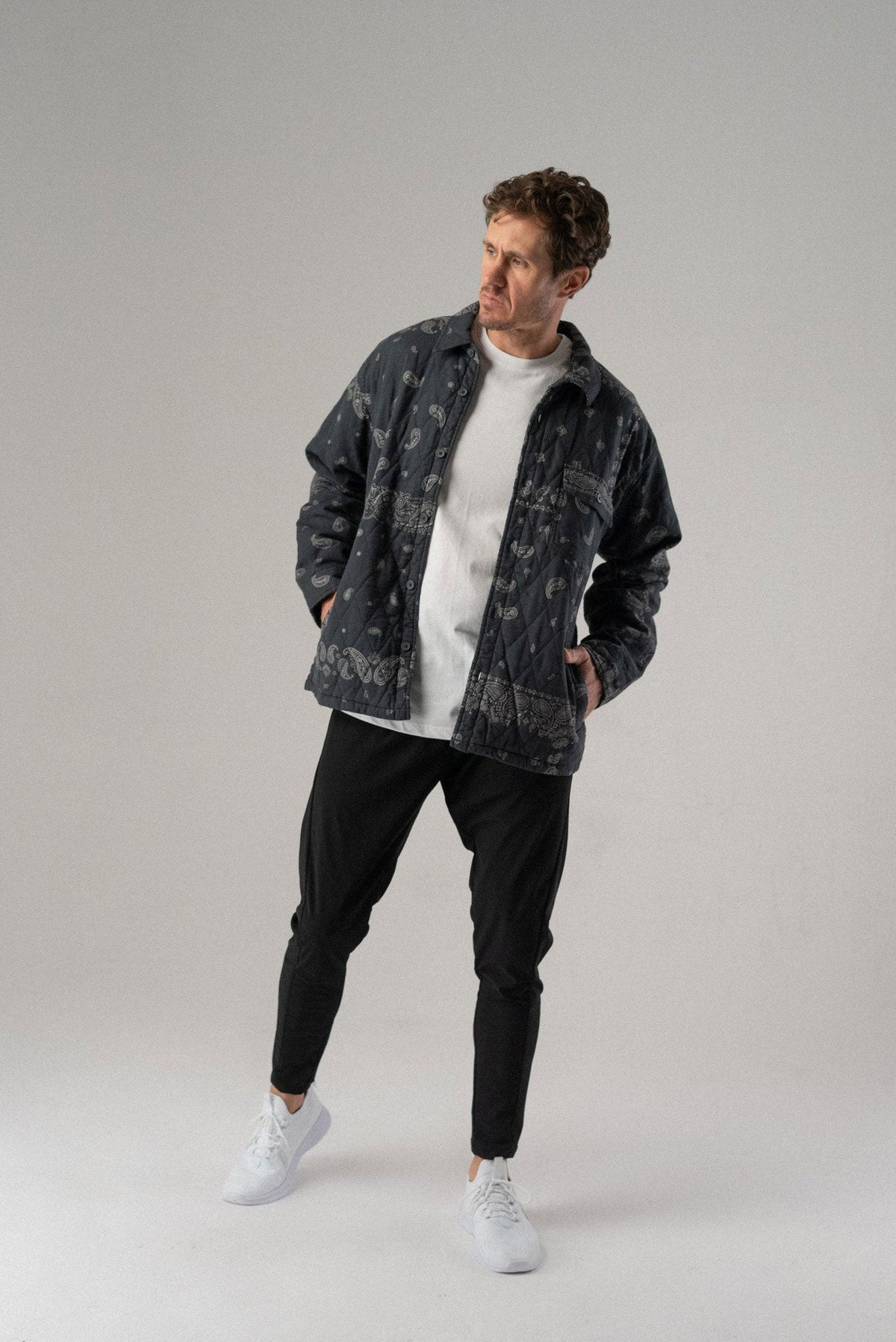 Black grit V2 pants with elastic waistband and tapered jogger legs