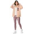Blush hooded windbreaker jacket with zip front and 'American Cowgirl' chest graphic