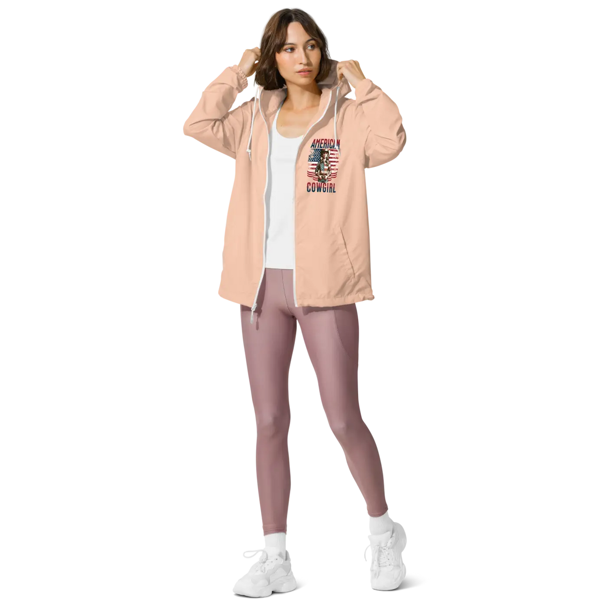 Blush hooded windbreaker jacket with zip front and 'American Cowgirl' chest graphic