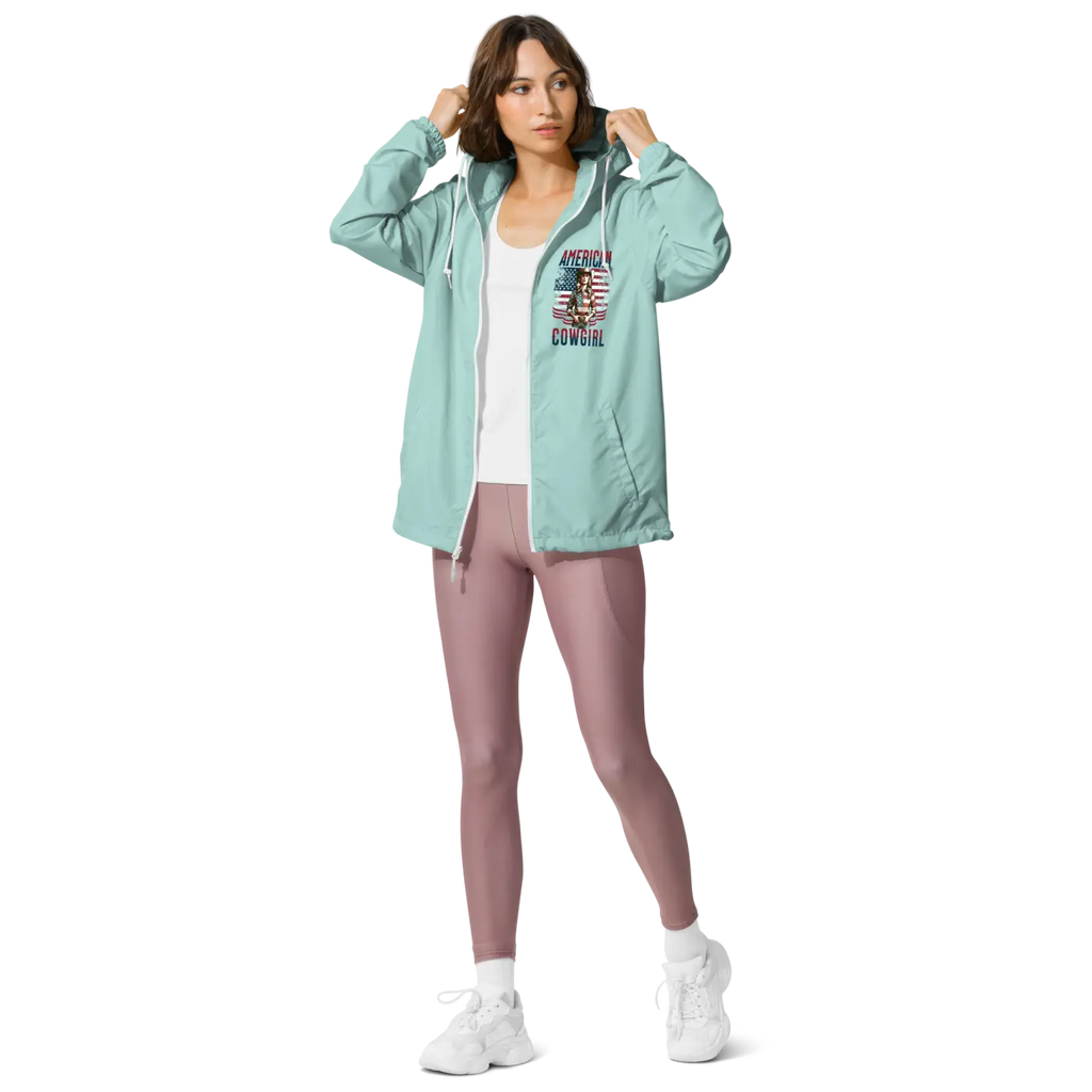 Aqua hooded windbreaker jacket with zip front and 'American Cowgirl' chest graphic