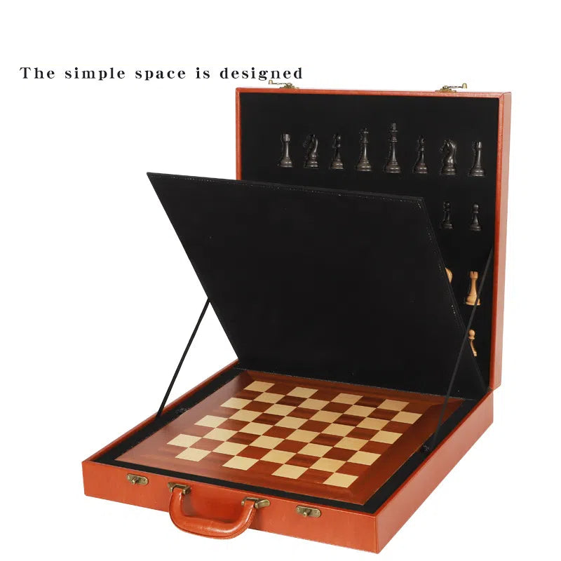 Wooden chessboard set with open case and black chess pieces on board