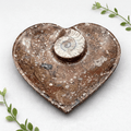 Heart-shaped decorative plate with brown speckled finish and white ammonite inlay