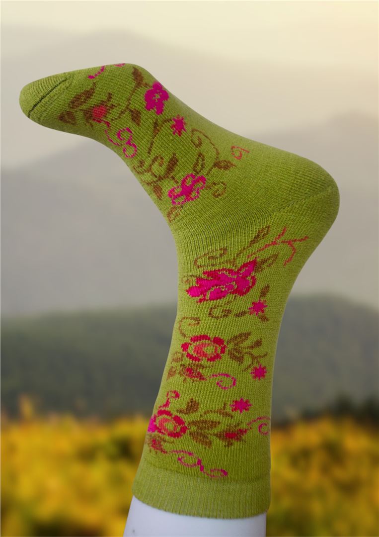 Lime green alpaca socks with pink floral motif and cushioned toe