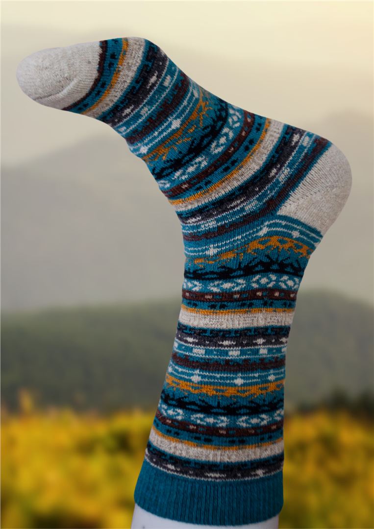 Blue patterned alpaca socks with gray toe and heel