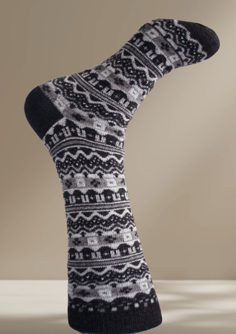 Alpaca socks in dark gray with black-and-white geometric knit pattern