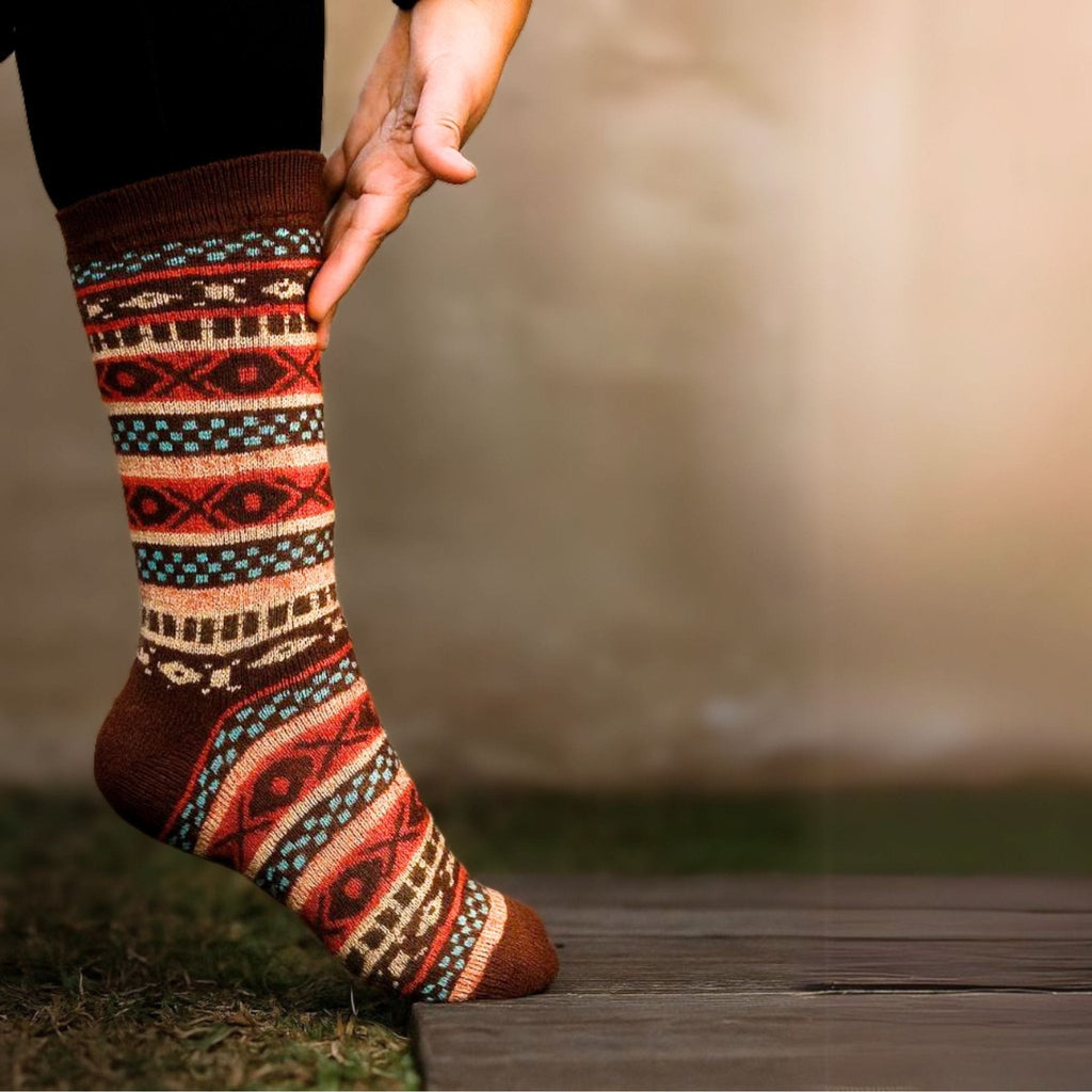 Alpaca socks in dark brown with multicolor geometric knit pattern