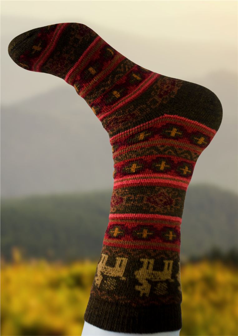 Alpaca socks in dark brown with red and gold geometric stripe pattern, dark cuff.
