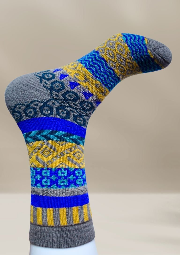 Alpaca socks in slate blue with yellow and blue geometric stripes