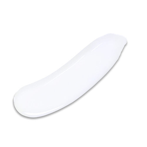Thick white sunscreen fluid swatch with smooth, curved application