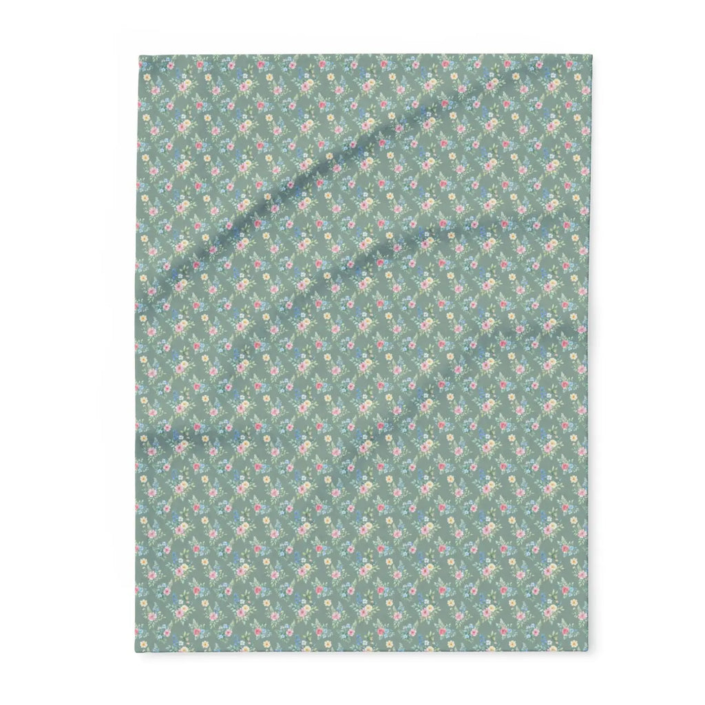 Pastel floral fleece blanket flat view, gray-green with scattered small pink flowers