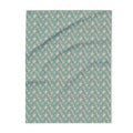 Pastel floral fleece blanket flat view, gray-green with scattered small pink flowers
