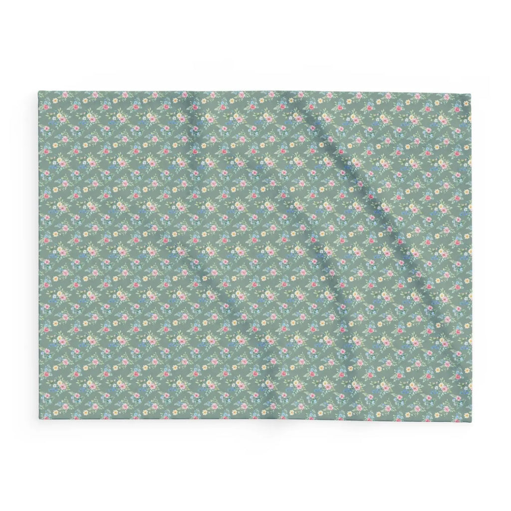 Pastel floral fleece blanket flat view, gray-green fabric with small pastel blossom print