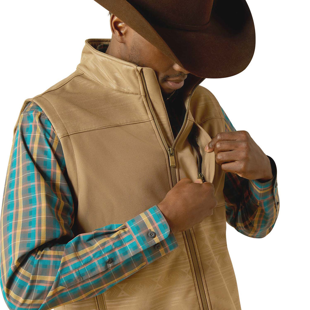 Khaki softshell vest close-up showing front zipper and side pocket