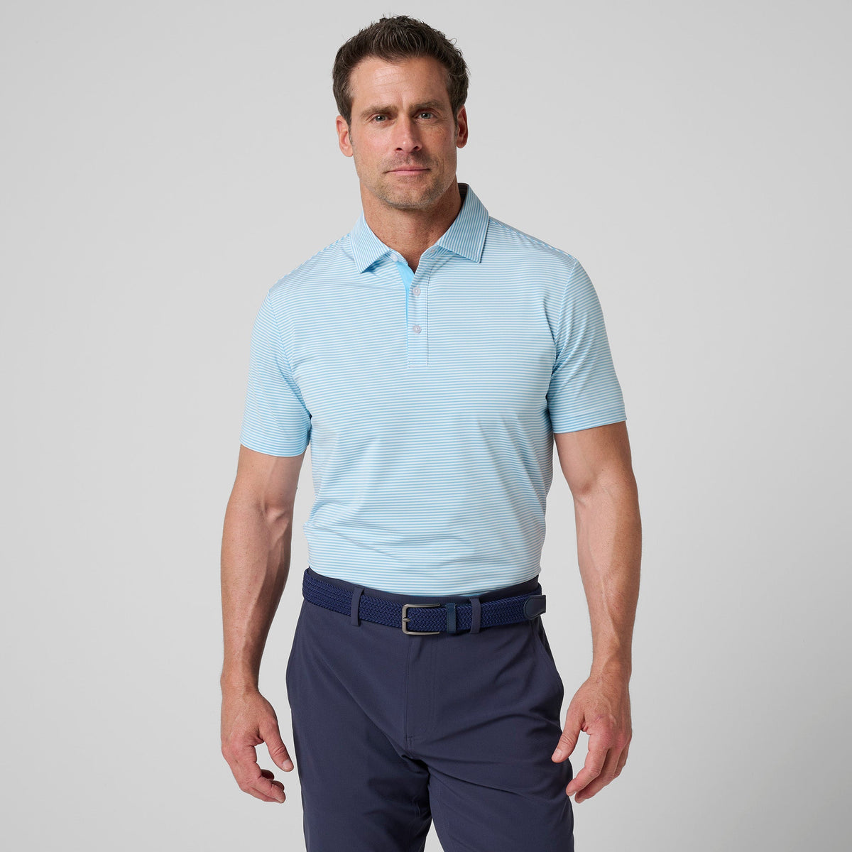 Light blue and white striped athletic polo shirt with buttoned collar