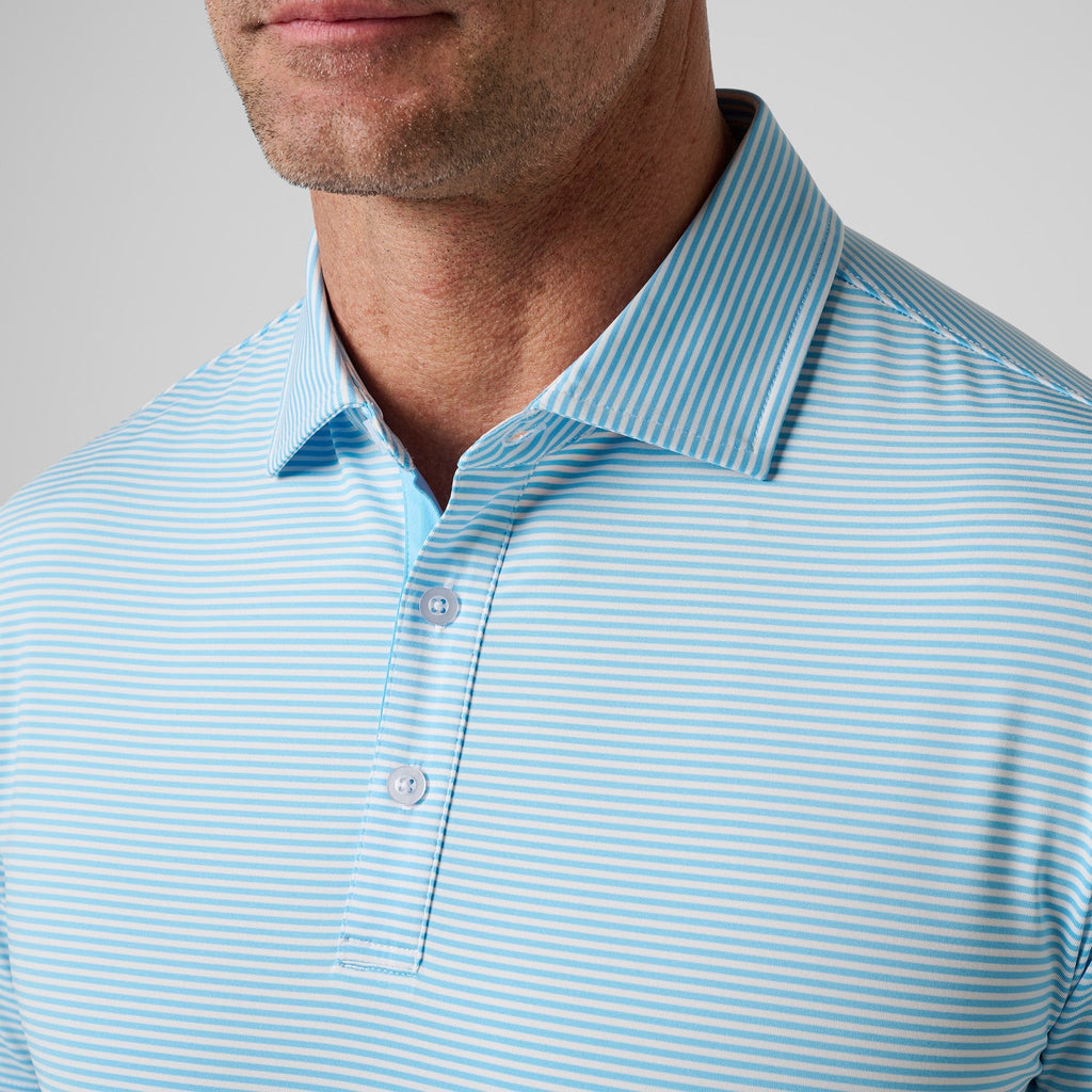 Close-up of light blue striped polo collar with placket and buttons